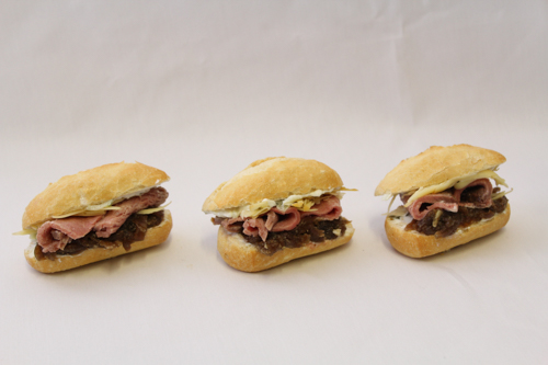 Beef, caramelized onion, and smoked cheddar mini baguette
